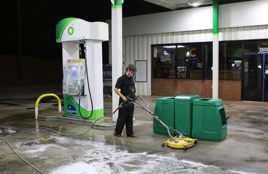 Commercial concrete pressure washing at gas station parking lot Raleigh NC