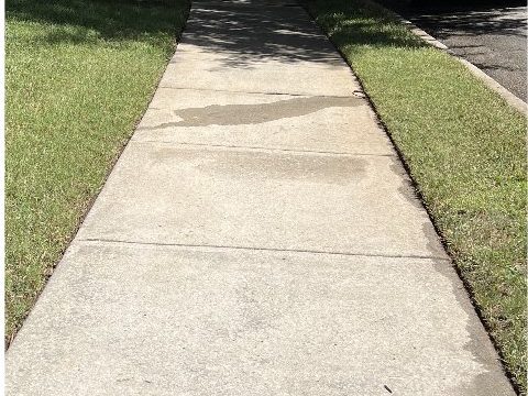 Clean sidewalk after pressure washing Cary NC