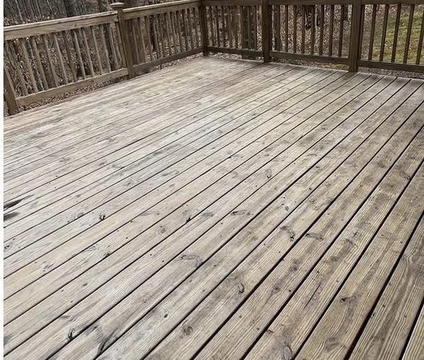 Restored clean wood deck after professional deck washing in Wake Forest NC
