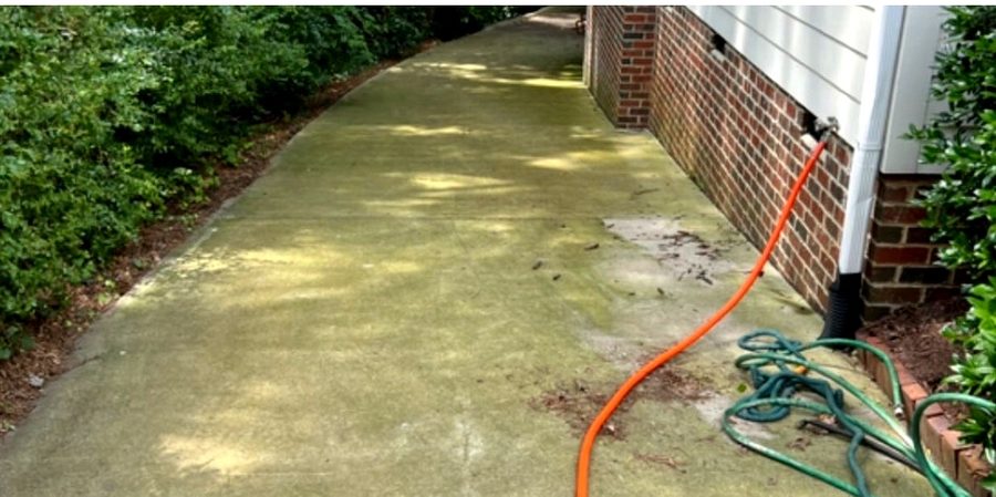 Clean bright driveway after professional pressure washing service Cary NC