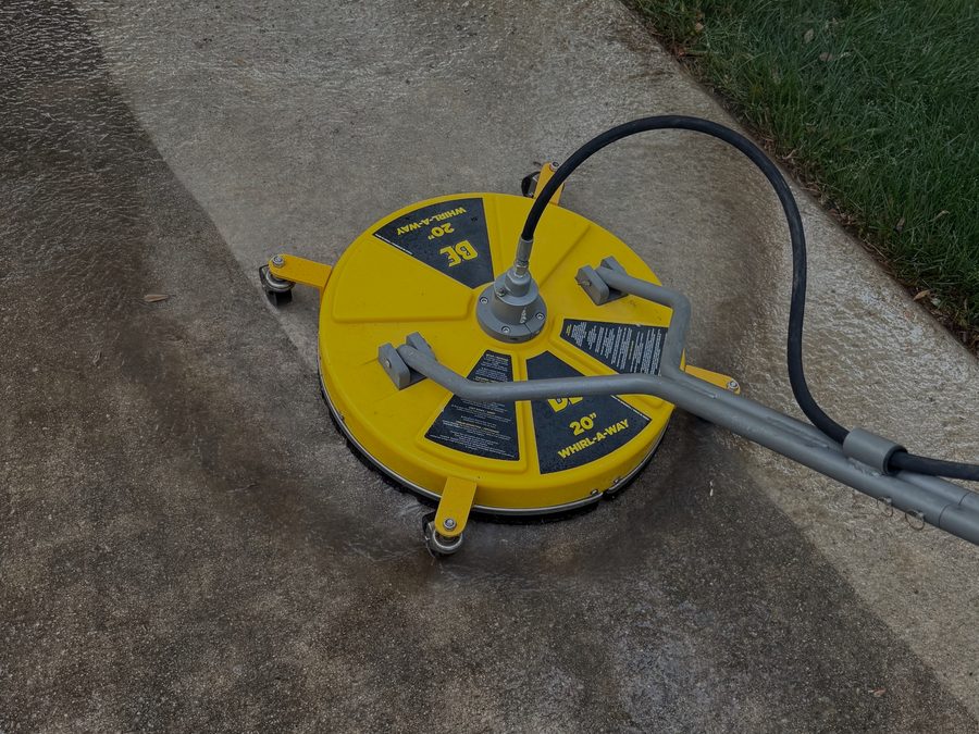 Professional driveway pressure washing with surface cleaner in Cary NC